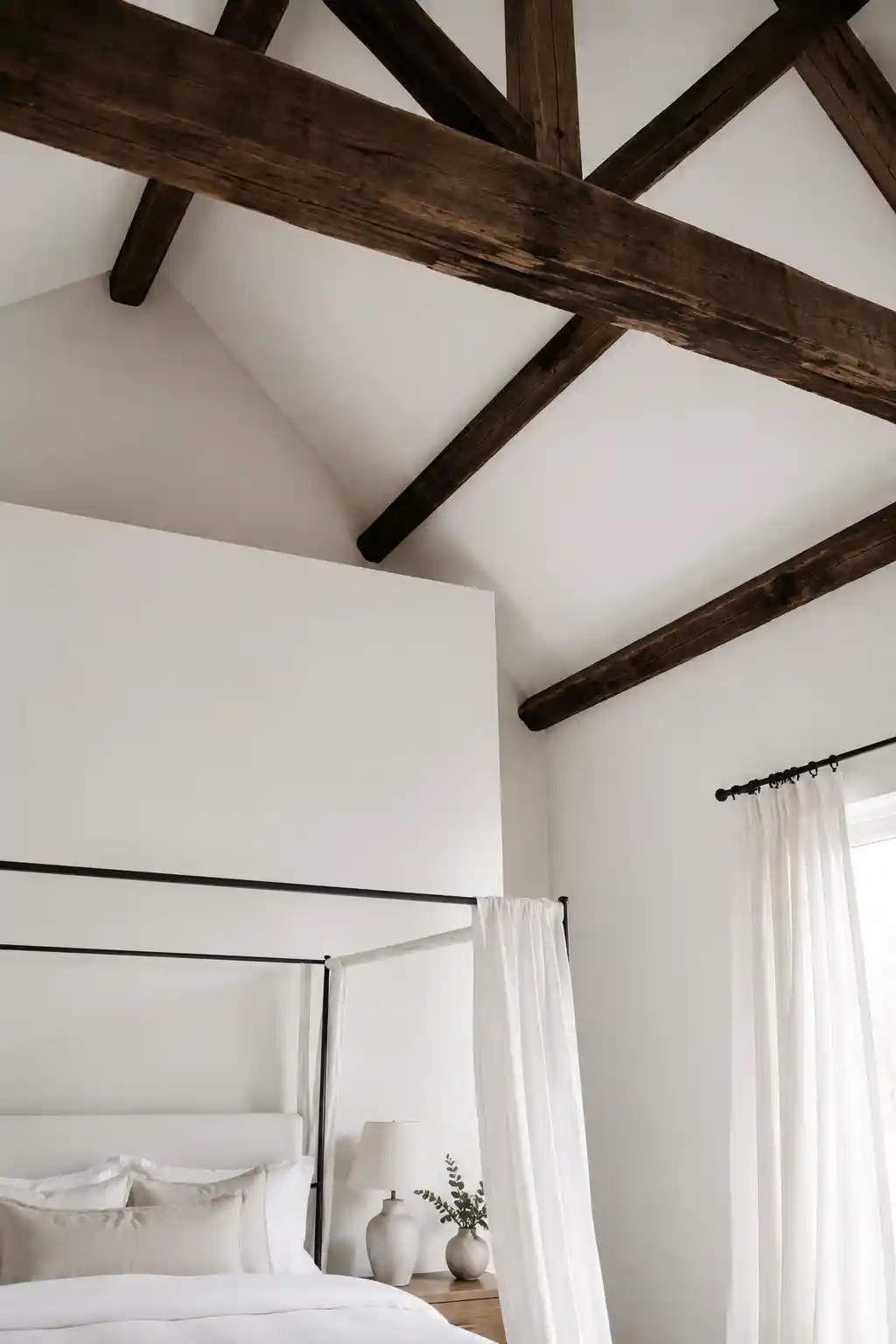 Exposed Beams Against Crisp White Walls